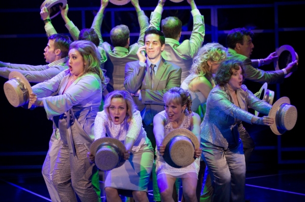 The cast of COMPANY serenades Bobby (Matthew Scott; center) as they sing 'Side By Sid Photo