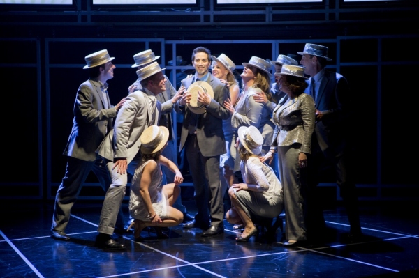The cast of COMPANY serenades Bobby (Matthew Scott; center) as they sing 'Side By Sid Photo