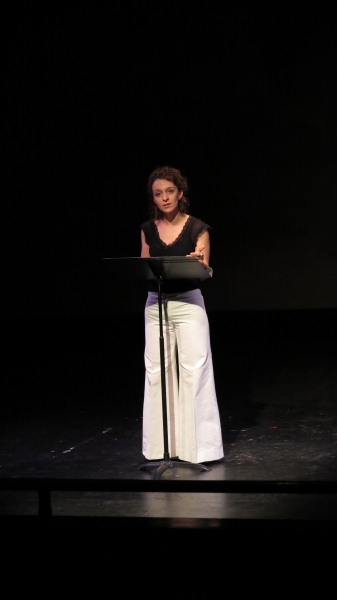 Cristina Spina reads an excerpt from ''Una Madre'' in a tribute to recently deceased  Photo