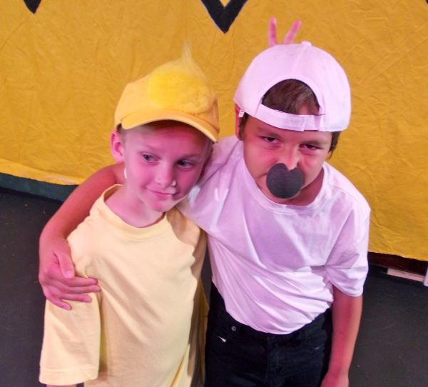 Collin George as Woodstock and Miles Synder as Snoopy Photo