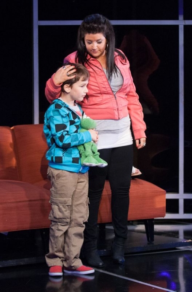 Son Jesse (Holden Browne, left) and mother Makalo (Carolyn Cole) keep each other stro Photo