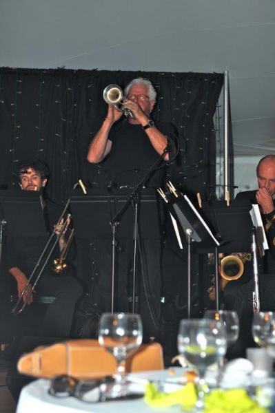 Arranger and Trumpet player Jim Hynes plays a solo of a recently discovered Johnny Me Photo