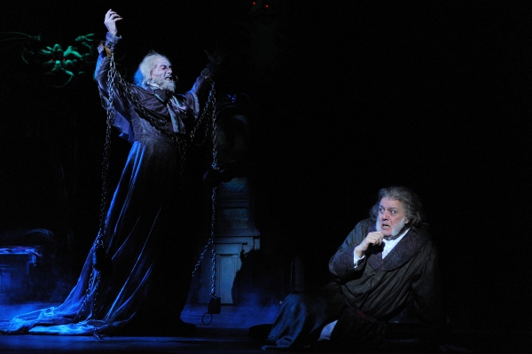 The Ghost of Jacob Marley (actor Lynn Robert Berg) warns Ebenezer Scrooge (actor Aled Photo