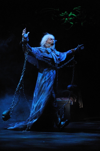 The Ghost of Jacob Marley (actor Lynn Robert Berg) warns Ebenezer Scrooge to change h Photo