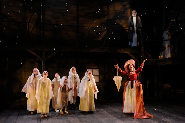 Angela Brazil as the Ghost of Christmas Present and the cast of A CHRISTMAS CAROL Photo