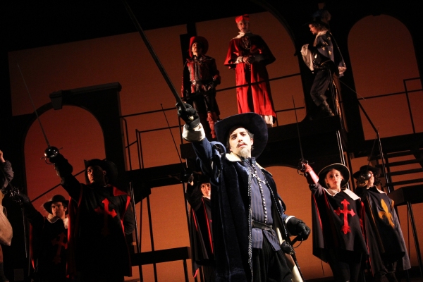 Alexander Savronsky as Captain De Treville (center) and (above) Rocco Sisto as Cardin Photo