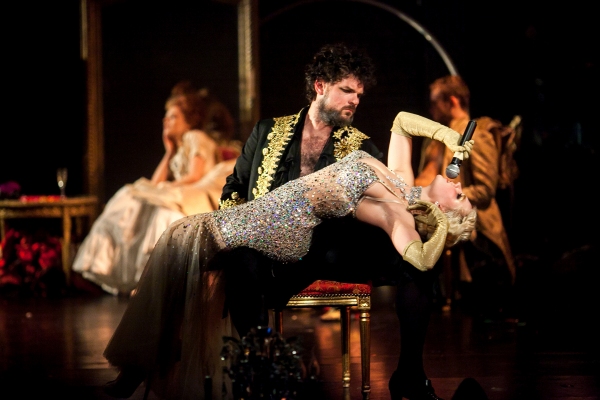 Katrina Cunningham (singing) and Jeff Takacs as Monsieur Drosselmeyer (seated) in Nut Photo