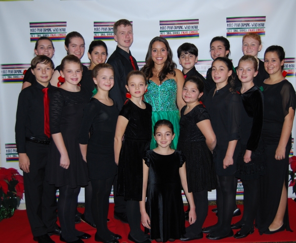 Gina Naomi Baez and the Kids Performing Who Kare Chorus Photo