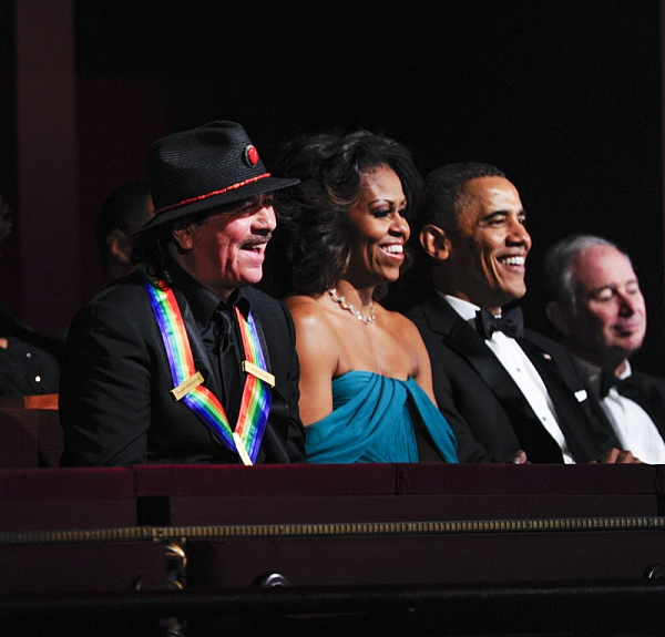 Musician and songwriter Carlos Santana, President and Mrs. Obama Photo