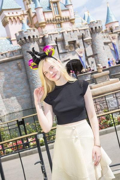 Photo Flash: MALEFICENT's Elle Fanning Visits Sleeping Beauty's Castle in Disneyland Image