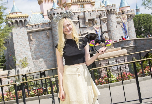 Photo Flash: MALEFICENT's Elle Fanning Visits Sleeping Beauty's Castle in Disneyland Image