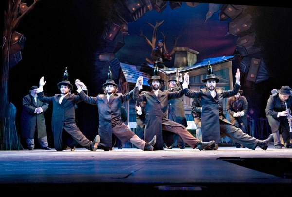 The famed bottle dance: front row, left to right: Hal Miers, Ben Delony, Cody Davis a Photo