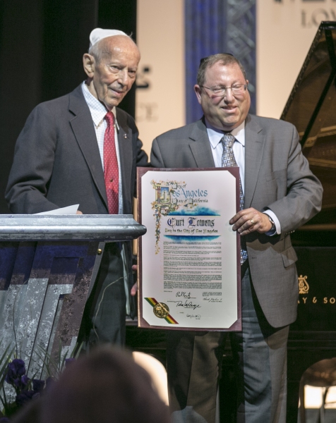 Curt Lowens, Holocaust survivor and hero of the Dutch Resistance is  presented a cert Photo