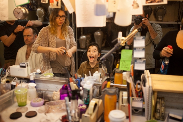 Adam Monley gets stage ready as Sarah Levine applies make-up to a very enthusiastic J Photo