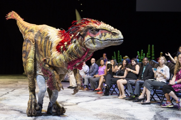 Photo Flash: WALKING WITH DINOSAURS Struts the Catwalk with 'Dinosaur Feathered Fashion Show' Image