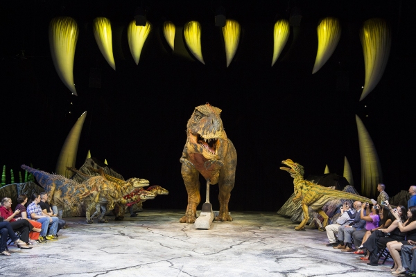 Photo Flash: WALKING WITH DINOSAURS Struts the Catwalk with 'Dinosaur Feathered Fashion Show' Image