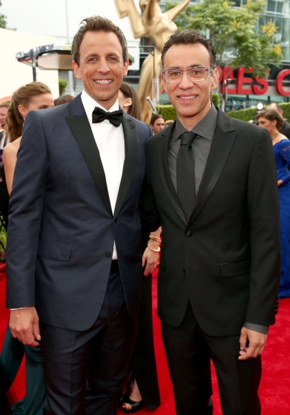 66th ANNUAL PRIMETIME EMMY AWARDS -- Pictured: (l-r) Host Seth Meyers and actor Fred  Photo