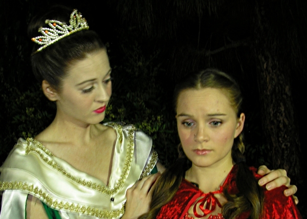 Cinderella (Heather Barnett) comforts Little Red Ridinghood (Carly Linehan) after she Photo