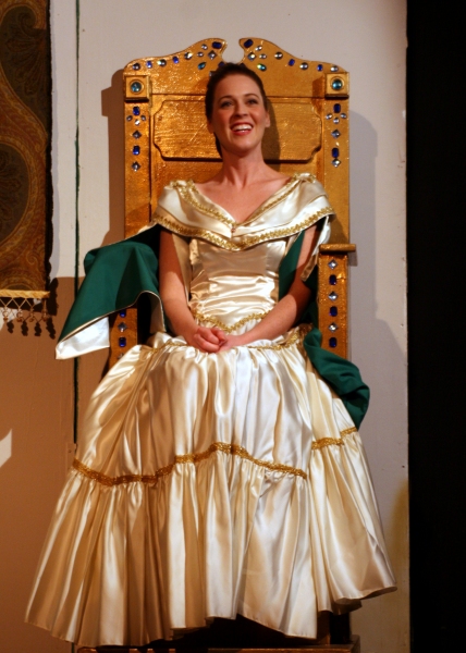 Cinderella (Heather Barnett) takes her place on the royal throne. Photo
