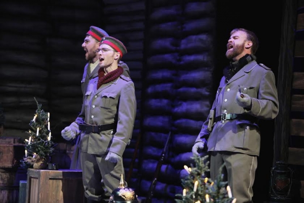 German soldiers sing Christmas carols. Left to right: Patrick McWilliams, Michael Get Photo