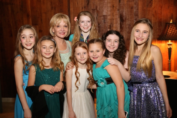 Executive Producer Cathy Rigby poses with the ensemble dancers Photo