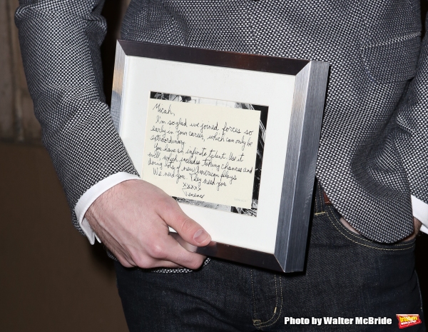 Micah Stock, with his treasured note from Terrence McNally Photo