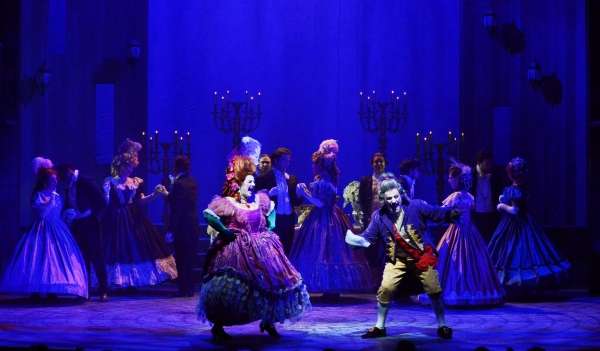 Mme. Thenardier (Margot Moreland) and Thenardier (Richard Vida) dance and sing while  Photo