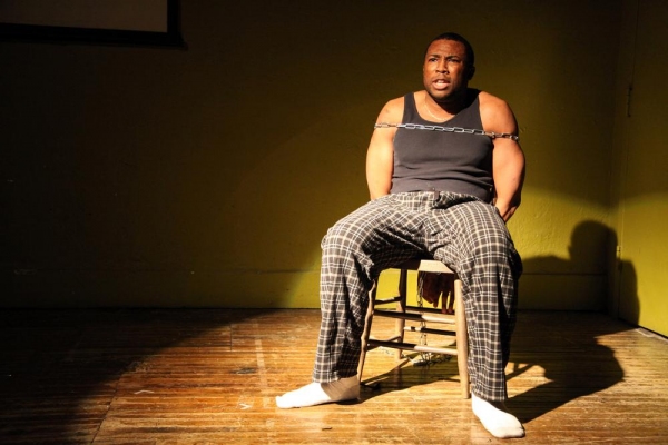 Steven Stinson in CHAINED TO A CHAIR by Kevin Alves, directed by Niki Dreistadt Photo