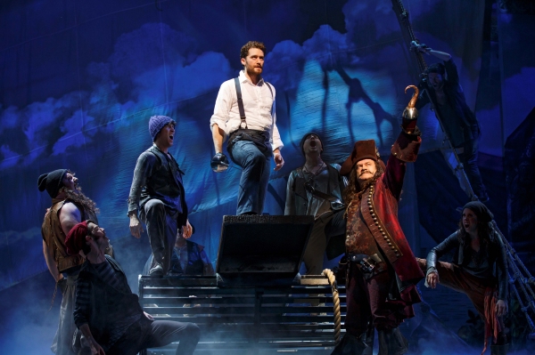 Matthew Morrison (center) and Kelsey Grammer (Captain Hook, front right) with the ens Photo