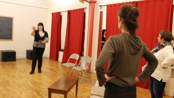 Director Cara Picone with cast members rehearsing LITTLE WARS Photo
