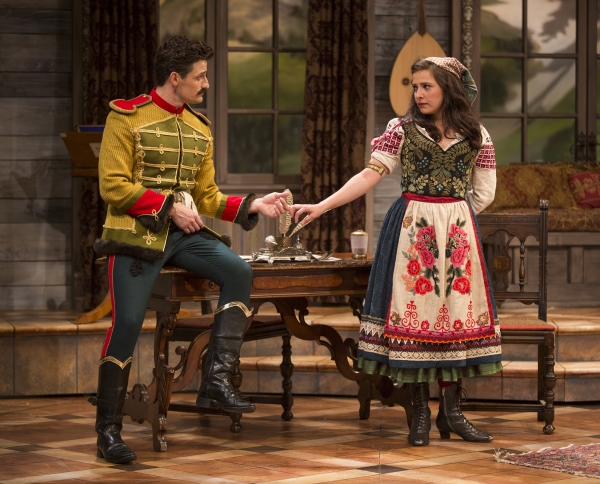 Enver Gjokaj as Major Sergius Saranoff and Sofiya Akilova as Louka Photo