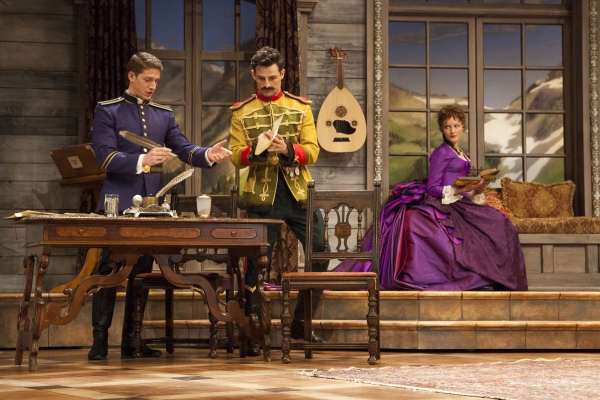 Zach Appelman as Captain Bluntschli, Enver Gjokaj as Major Sergius Saranoff, and Wren Photo