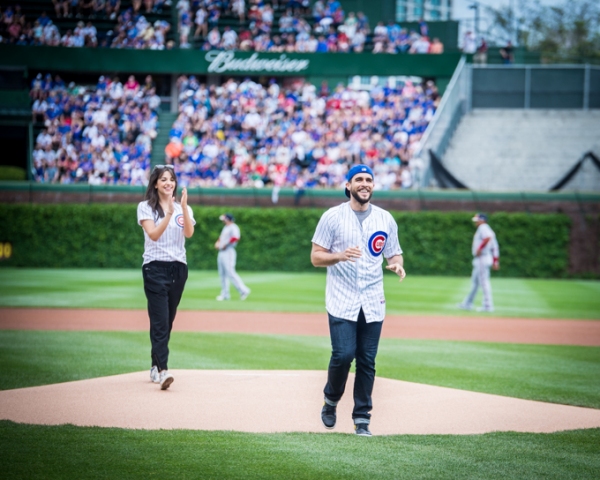 Exclusive Photo Coverage: ON YOUR FEET Stars Ana Villafañe and Josh Segarra Throw Out First Pitch at Chicago Cubs Game  Image