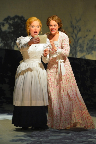 Petra (Marissa McGowan) and Anne Egerman (Laurie Veldheer) receive an invitation to a Photo