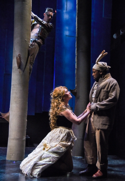 Nick Cearley (as Puck) looks on as Jenny Strassburg (as Titania)  and Warren Jackson  Photo