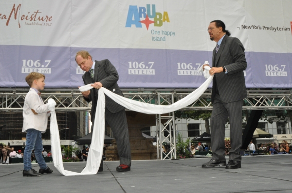 Iain Armitage with Raymond Teller and Penn Jillette Photo