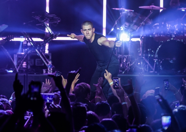 Photo Flash: Nick Jonas and Demi Lovato Take the Stage for MTV's VMA Benefit Concert Image
