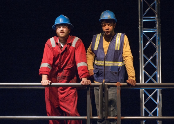 Ensemble members Justin James Farley (right) and Chris Rickett portray oil rig worker Photo