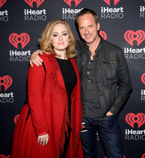Adele and President, National Programming Platforms for Clear Channel Radio Tom Polem Photo