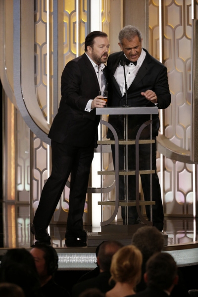 73rd ANNUAL GOLDEN GLOBE AWARDS -- Pictured: (l-r) Ricky Gervais, Host; Mel Gibson, P Photo