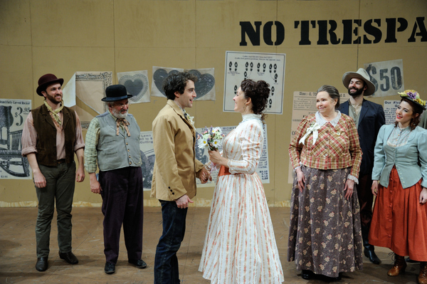 Charlie Thurston as Curly and Rachael Warren as Laurey (center) with the cast of OKLA Photo