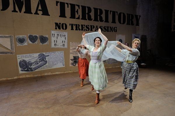 Rachael Warren as Laurey (center) and ensemble members Hannah Spacone and Shura Barys Photo