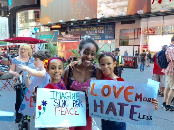 Young people from the Broadway community sing John Lennon's 'Imagine' for peace Photo