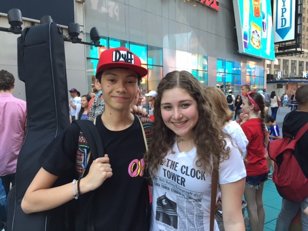 Young people from the Broadway community sing John Lennon's 'Imagine' for peace Photo