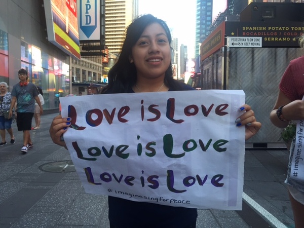 Young people from the Broadway community sing John Lennon's 'Imagine' for peace Photo