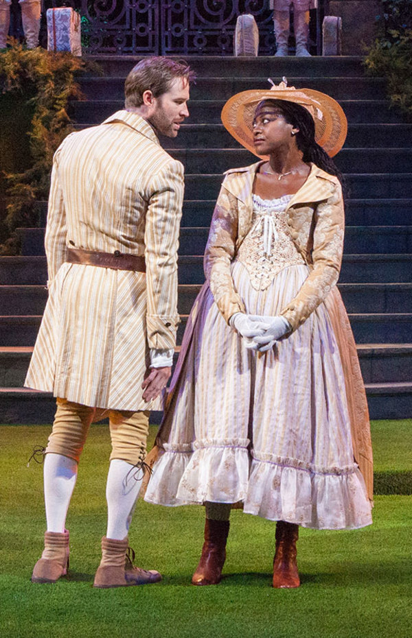 Kieran Campion as Berowne and Pascale Armand as Rosaline Photo