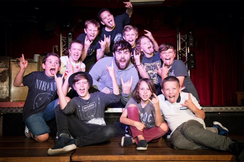 They're in the Band- David Fynn Will Lead SCHOOL OF ROCK in London! Image