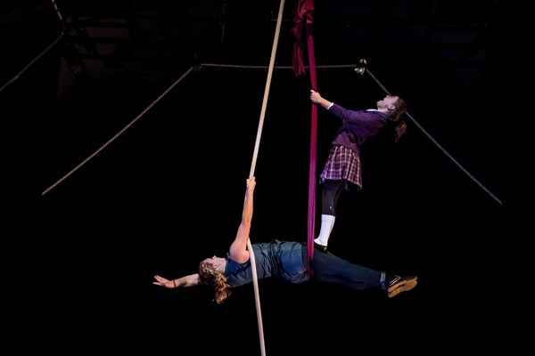 Sadie Sims and Maggie Stone perform on aerial silk sling and Spanish web Photo