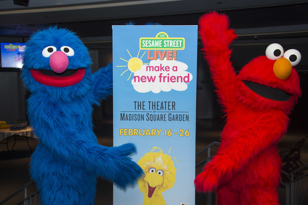 Sesame Street Live characters helped children from SCO Family of Services make friend Photo