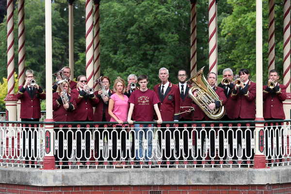 Miriam Grace Edwards, Ash Matthews, and Jeffrey Holland with the colliery brass band Photo